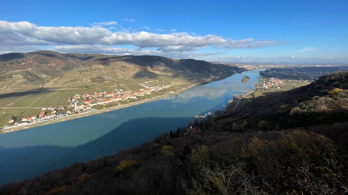 aerial view of lake and mountains during daytime